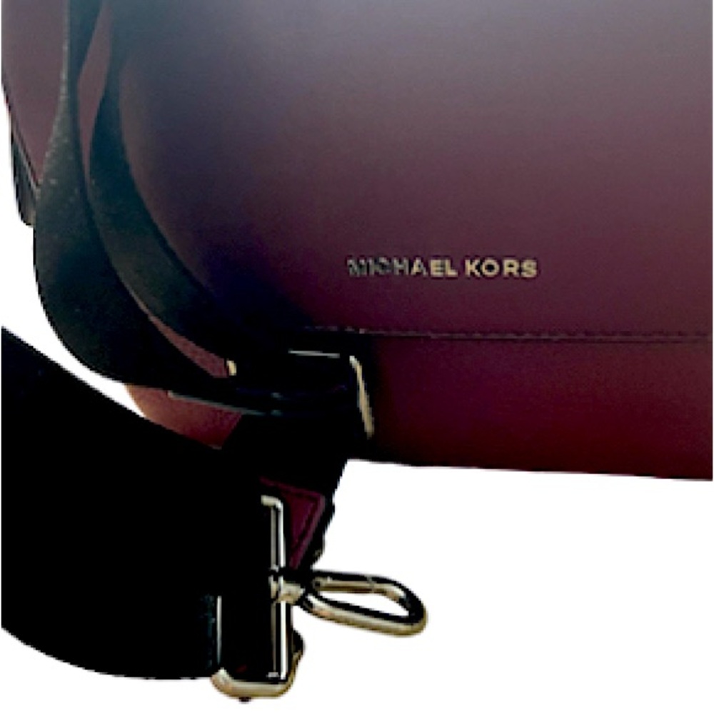 Authentic Michael Kors sling bag. Burgundy.